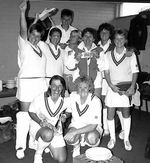 Some members of England Women's team celebrate in a changing room