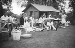 Myrtle Maclagan with unidentified players at Cricket Week 1949 from her photo album